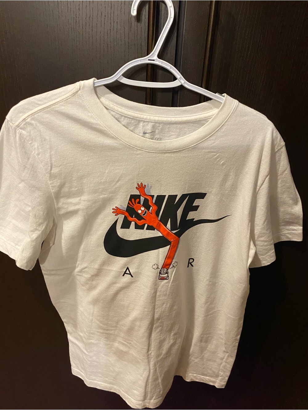 Nike White Tee with Black Swoosh and Orange Graphic